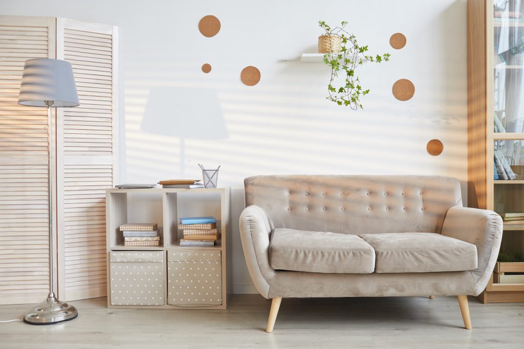 apartment living room with decals on the wall