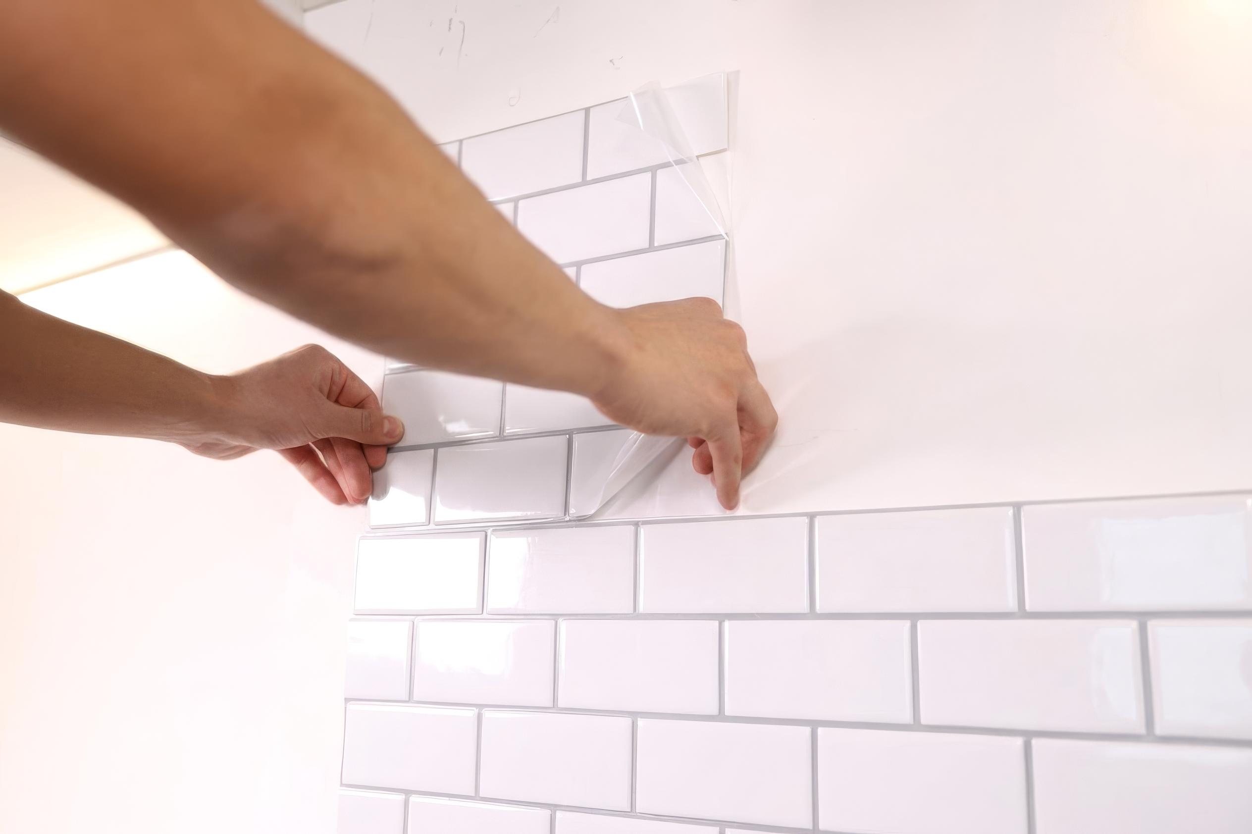 Applying peel and stick backsplash tile sheet to a smooth painted rental wall